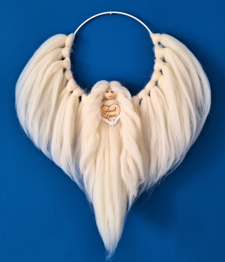 Biały anioł na obręczy